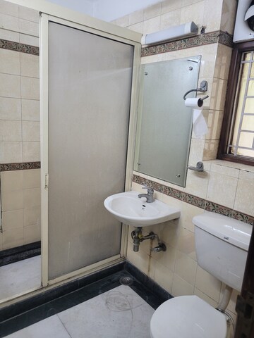 Bathroom in 3 BHK Apartment at Ayaan Antariksh Apartment, Rohini – for Rent