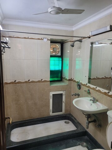 Bathroom in 3 BHK Apartment at Ayaan Antariksh Apartment, Rohini – for Rent