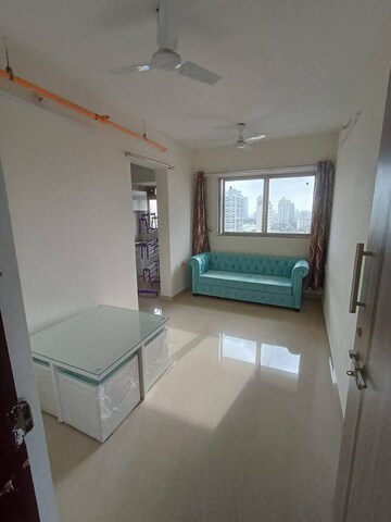 Living Room in 1 BHK Apartment at Satellite Garden, Goregaon East – for Rent