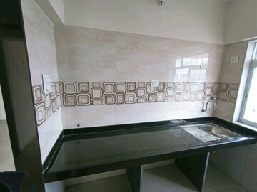 Kitchen in 2 BHK Apartment at Rushi The Kollage, Andheri East – for Sale