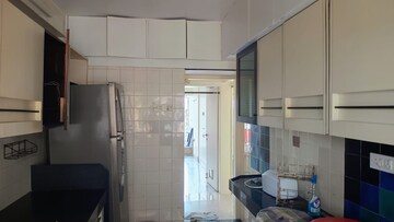 Kitchen in 2 BHK Apartment at Saibaba Tower, Andheri West – for Rent