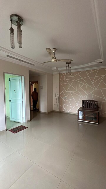 Living Room in 2 BHK Apartment at G K Dwarka Queens Park, Pimple Saudagar – for Rent