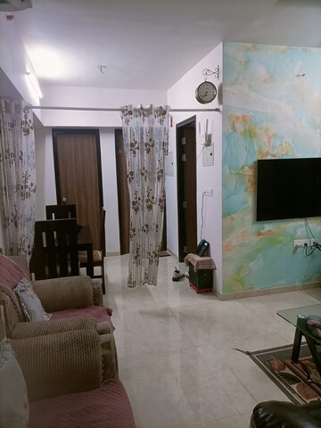 Living Room in 1 BHK Apartment at Lodha Amara, Kolshet Road – for Rent
