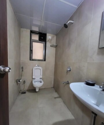 Bathroom in 2 BHK Apartment at Runwal Eirene, Balkum Pada – for Rent
