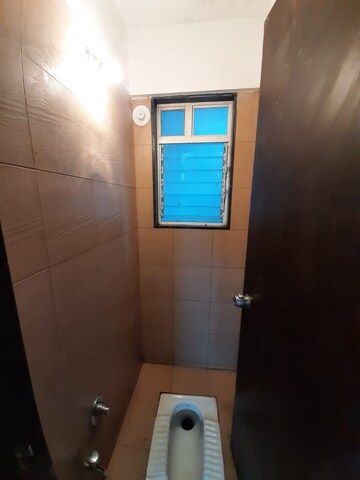 Bathroom in 2 BHK Apartment at Beharay Rathi Hillview Residency, Kothrud – for Rent