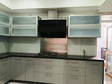 Kitchen in 3 BHK Apartment at Mahagun Mezzaria, Sector 78 – for Rent
