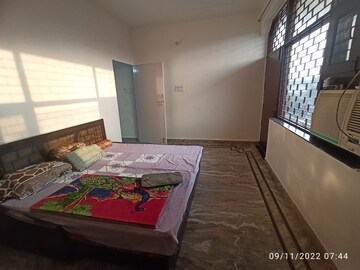 Bedroom in 2 BHK Builder Floor at AWHO Apartments, Sector 22 – for Rent