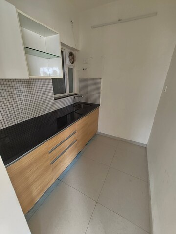 Kitchen in 2 BHK Apartment at Omkar Signet, Malad East – for Rent