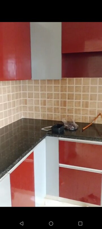 Kitchen in 2 BHK Apartment at Mahagun Mywoods, Sector 16c Greater Noida – for Rent