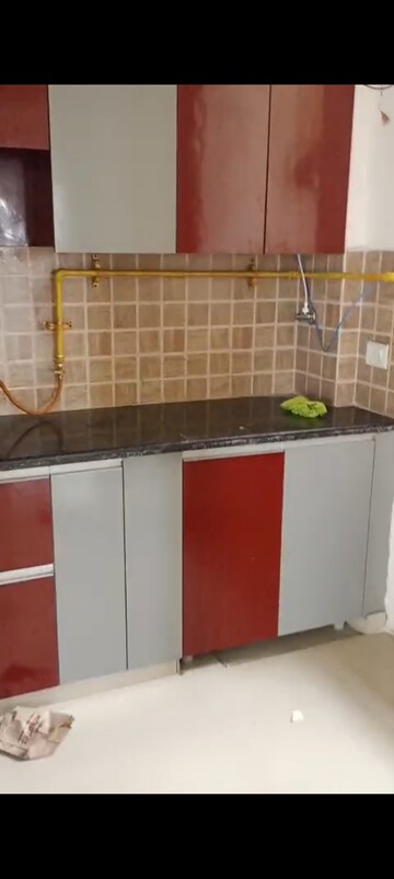 Kitchen in 2 BHK Apartment at Mahagun Mywoods, Sector 16c Greater Noida – for Rent