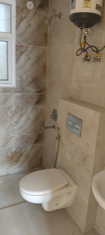 Bathroom in 3 BHK Apartment at Omaxe The Palace, Gomti Nagar – for Rent