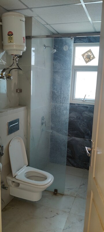 Bathroom in 3 BHK Apartment at Omaxe The Palace, Gomti Nagar – for Rent