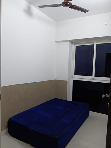 Bedroom in 2 BHK Apartment at Shapoorji Pallonji Siennaa, Kandivali East – for Rent