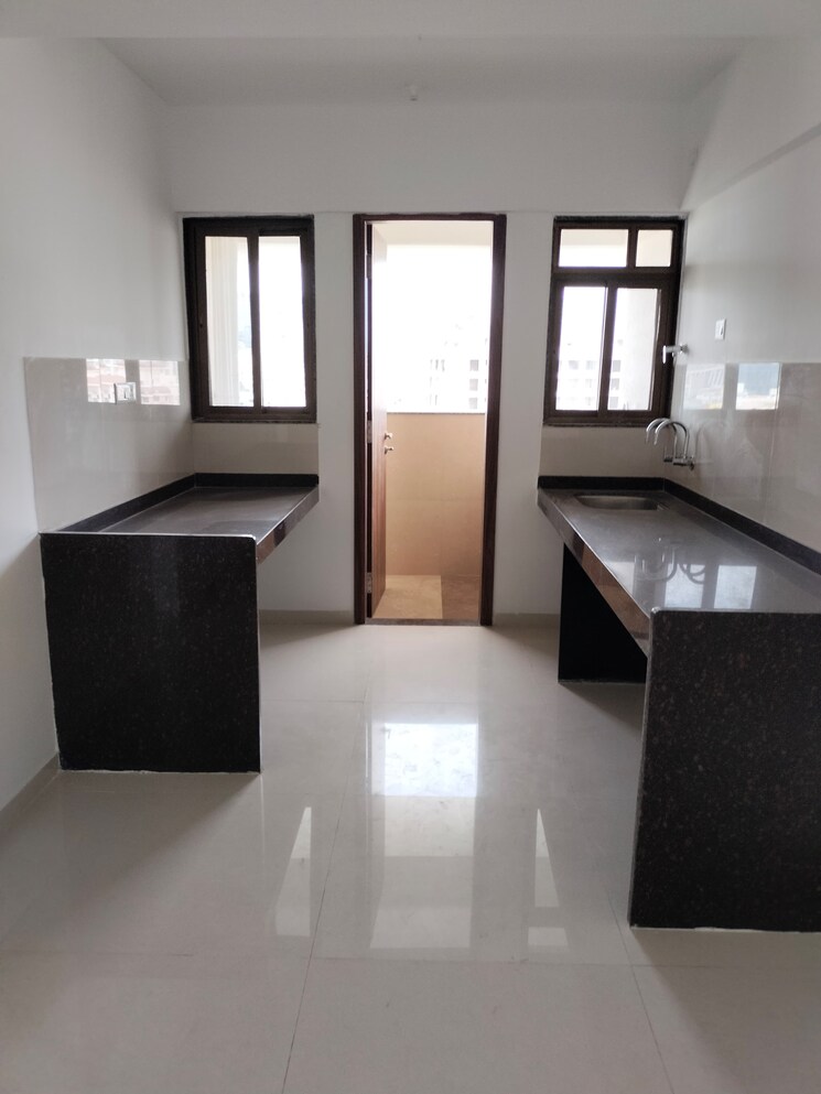 Kitchen, arv-uthville 2 Bedroom 705 Sq.Ft. Apartment In Kharadi Pune 9083121