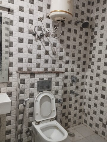 Bathroom in 3 BHK Builder Floor at Sushant Lok I – for Rent