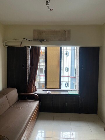 Living Room in 1 BHK Apartment at Harmony Tower Chs Ltd, Mulund West – for Sale