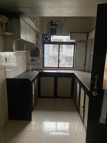 Kitchen in 1 BHK Apartment at Harmony Tower Chs Ltd, Mulund West – for Sale