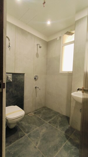 Bathroom in 4 BHK Apartment at Dhakoli – for Sale