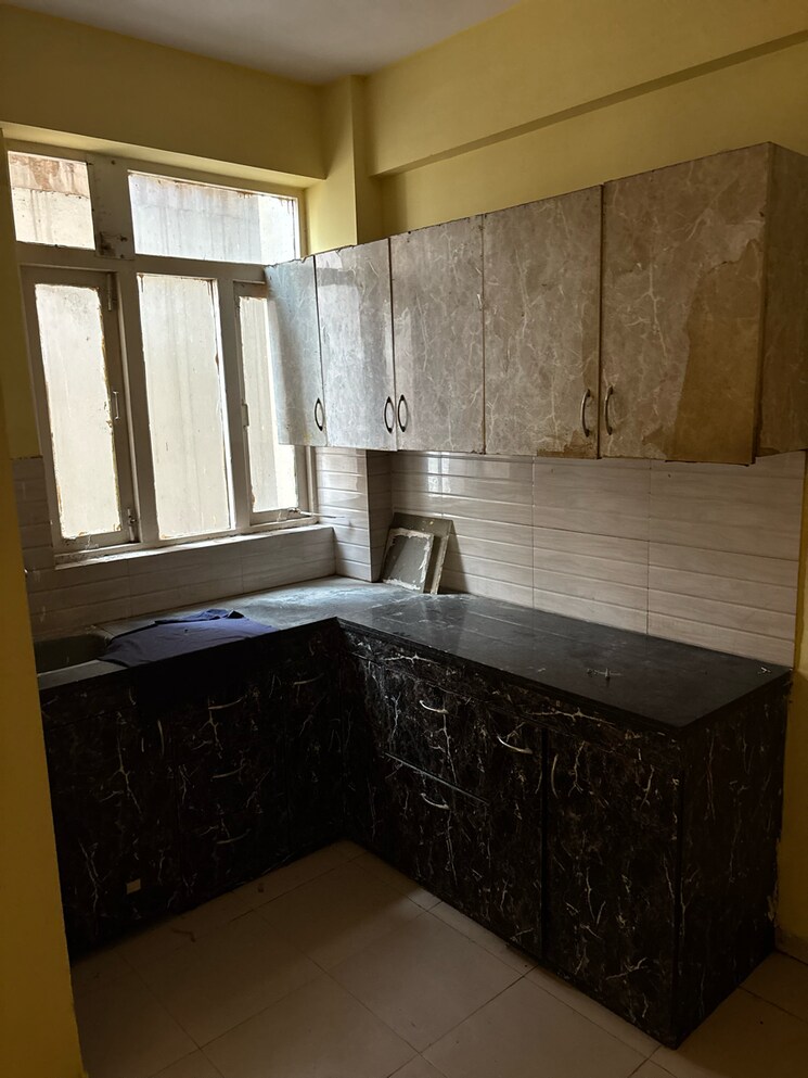 Kitchen, auric-city-homes 3 Bedroom 647 Sq.Ft. Apartment In Neharpar Phase 2 Faridabad 9083317