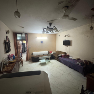 Living Room in 2 BHK Apartment at Lajpat Nagar – for Sale