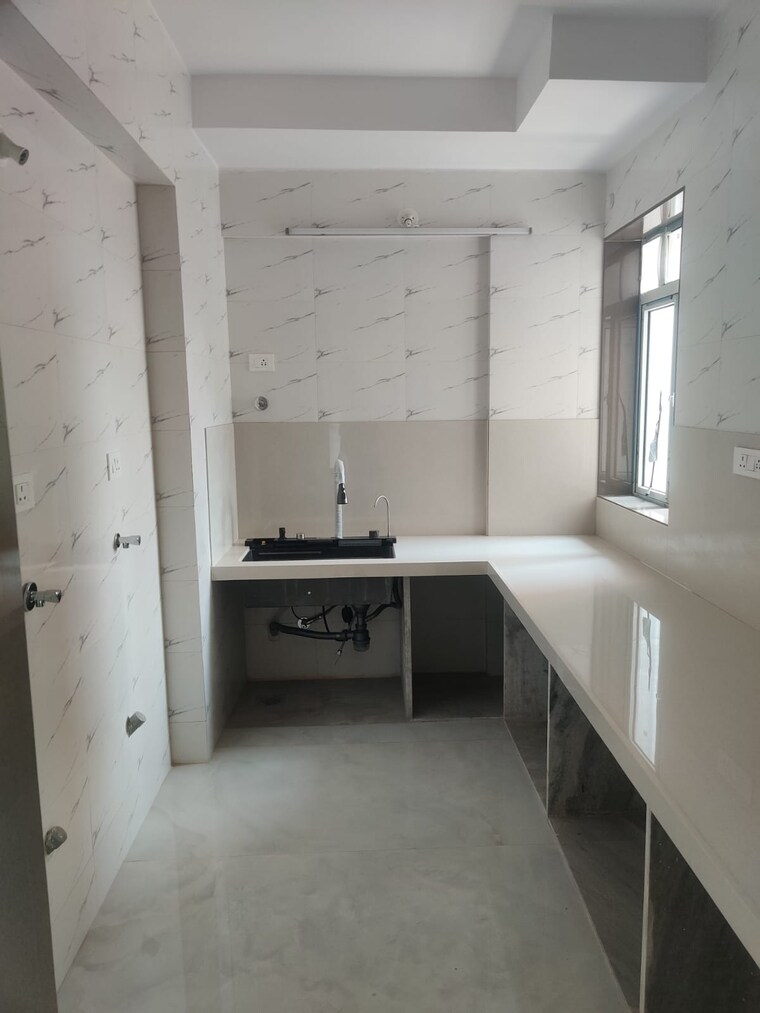 Kitchen, highland-residency-chsl 2 Bedroom 692 Sq.Ft. Apartment In Balkum Pada Thane 9083335