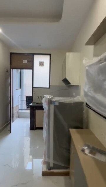 Kitchen in 1 RK Apartment at DLF City Phase III, Sector 24 – for Rent