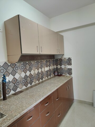 Kitchen in 2 BHK Apartment at Signature Global Proxima, Sector 89 – for Rent