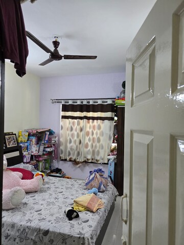 Bedroom in 2 BHK Apartment at Mirchandani Palms, Rahatani – for Sale