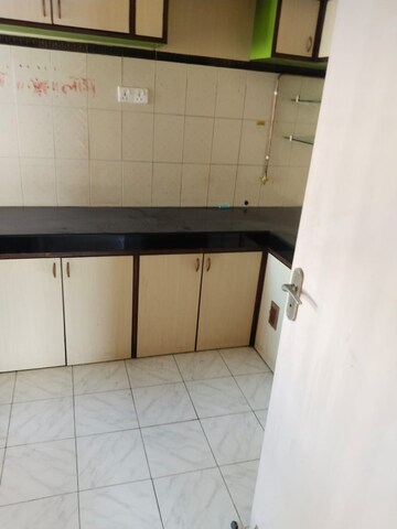 Kitchen in 2 BHK Apartment at Valley Towers Annex, Manpada – for Rent