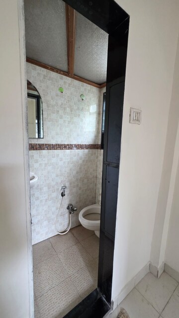 Bathroom in 2 BHK Apartment at Evershine Embassy, Andheri West – for Sale