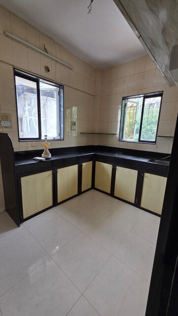Kitchen in 2 BHK Apartment at Evershine Embassy, Andheri West – for Sale