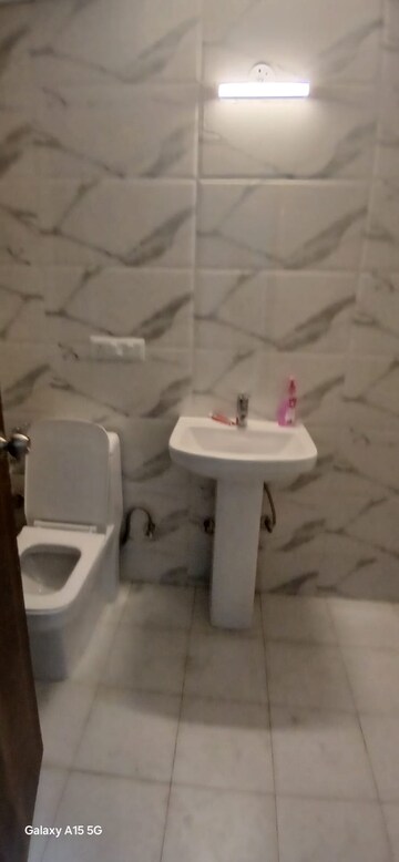 Bathroom in 3 BHK Apartment at Gulshan Bellina, Sector 16 Greater Noida – for Rent