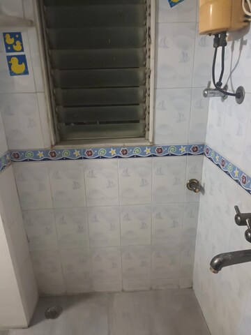 Bathroom in 1 BHK Apartment at Asmita Jyoti CHS, Malad West – for Rent