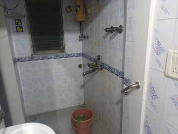 Bathroom in 1 BHK Apartment at Asmita Jyoti CHS, Malad West – for Rent