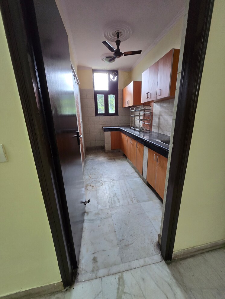 Kitchen, dayanand colony 3 Bedroom 900 Sq.Ft. Builder Floor In Dayanand Colony Delhi 9083595