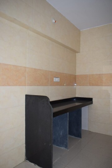 Kitchen in 2 BHK Apartment at Omkara Unchai, Borivali West – for Sale