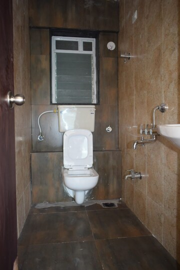 Bathroom in 2 BHK Apartment at Omkara Unchai, Borivali West – for Sale
