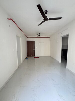 Living Room in 1 BHK Apartment at Runwal Gardens, Dombivli East – for Sale