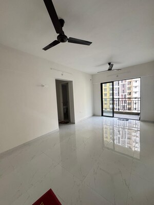 Living Room in 1 BHK Apartment at Runwal Gardens, Dombivli East – for Sale