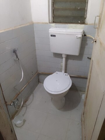 Bathroom in 1 BHK Apartment at Raj Satyam CHS, Dahisar East – for Rent