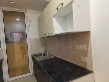 Kitchen in 3 BHK Apartment at Niho Saffron Scottish Garden, Ahinsa Khand 2 – for Sale