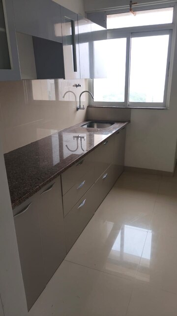 Kitchen in 1 BHK Apartment at Raunak Delight, Owale – for Rent