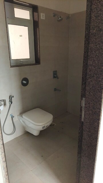 Bathroom in 1 BHK Apartment at Raunak Delight, Owale – for Rent