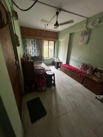 Living Room in 1 BHK Apartment at Kalyan West – for Sale
