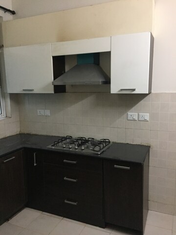 Kitchen in 3 BHK Builder Floor at Ansal API Esencia, Sector 67 – for Rent