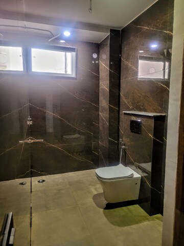 Bathroom in 4 BHK Apartment at Sushant Lok I – for Sale
