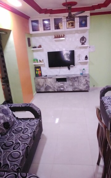 Living Room in 1 BHK Apartment at Bhumiraj Woods, Kharghar – for Sale