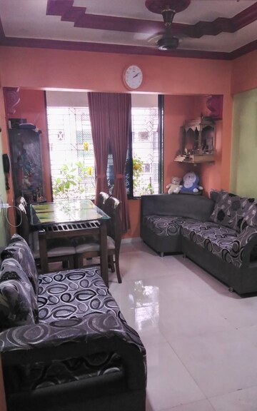 Living Room in 1 BHK Apartment at Bhumiraj Woods, Kharghar – for Sale