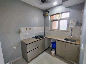 Kitchen in 1 BHK Apartment at Hiranandani Solitaire Studio Apartment, Ghodbunder Road – for Rent