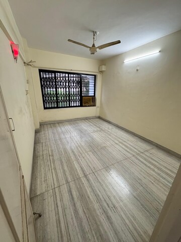 Bedroom in 2 BHK Apartment at Nalanda CHS, Vashi Sector 17 – for Rent